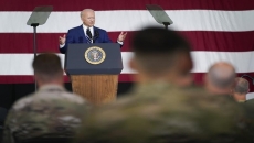 Biden marks vaccine progress, thanks troops ahead of holiday