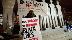 Thousands Hold Vigil In Toronto For Slain Ferguson Black Teenager