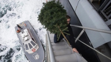 Stranded Crew Receives Load Of Christmas Cheer That Includes Pig, Tree, Presents