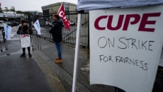 Metro Vancouver residents scramble for another ride as bus strike drags into Day 2