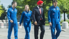 Canada's Two New Astronauts Get Rousing Ovation At Space Agency Near Montreal