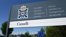 Canada's spy watchdog's past oil ties spark concerns