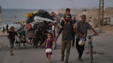 Canada calls Israel's Gaza surge 'horrific,' suggests it violates international law