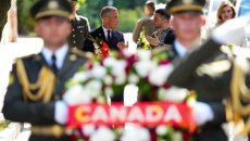 'Not a very funny place': Canadians part of a growing makeshift memorial in Kyiv