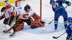 2015 Stanley Cup Playoffs: Daniel Sedin Scores Winner As Canucks Down Flames To Force Game 6