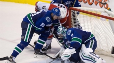 Ryan Miller earns 300th career NHL win as Canucks down Hurricanes 4-1
