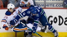 Ryan Miller Returns From Injury, Stops 23 Shots As Canucks Edge Oilers In Overtime