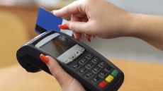 Visa, MasterCard Cut Swipe Fees in Canada