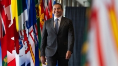 Carney nearly begged premiers to put U.S. booze back on shelves to secure deal: Kinew