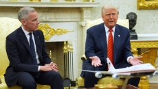 Trump digs in on his protectionist trade approach in meeting with Carney