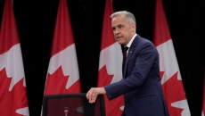 Carney says new Canadians told to surrender citizenship documents deserve answers