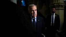 Carney 'disappointed' by Air Canada impasse, urges both sides to reach a deal