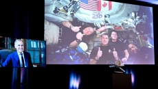 Carney praises Hansen, calls hearing French from space a point of pride