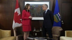 Carney, Smith set to make energy announcement; carbon price deal expected