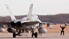 Canada faces new Cold War in Europe and hot war against ISIL in Iraq in 2015