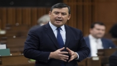 Champagne, Tory critic Chong spar over China