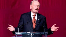 Ex-PM Chretien backs Trudeau position on Iraq, criticizes Harper in column
