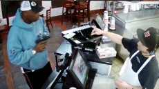 Watch: This American Cashier Has The Most Calm Reaction To Being Robbed At Gunpoint
