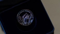 UK unveils coin on Mahatma to mark Diwali