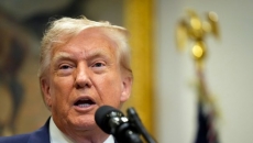 Trump signs executive order pushing tariffs on Canada to 35 per cent