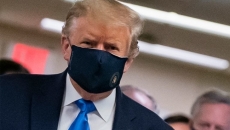US President Donald Trump seen wearing a mask in public for the first time.