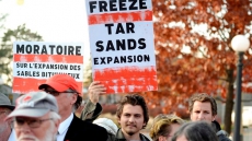 Protesters Stage Sit-in On Justin Trudeau's Doorstep To Push For Action On Emissions