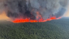 Evacuation orders lifted in B.C. and Alberta towns as wildfires recede