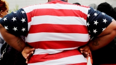 US Adults Aren't Getting Taller, But Still Putting On Pounds