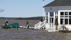 WATCH: Homeowner's Video Shows Waves Crashing Into New Brunswick Sunroom