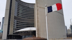 Toronto city hall flies French flag to honour those slain at Charlie Hebdo