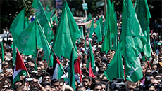 Hamas tells Gaza rally war is not over until its demands are met, rockets trained at Tel Aviv