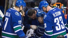 Desjardins says Hansen looks OK after collapsing on bench and leaving game