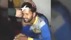 New Video In Kashmir Shows Hizbul Mujahideen Militants Torturing Two Youth