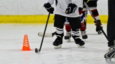 Despite sore joints, aching muscles, hockey players set new record for longest game