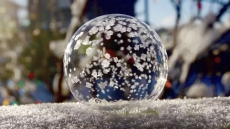 WATCH: Calgary Photographer Produces Viral Ice Bubble Video During Cold Snap