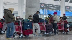 Trudeau says travel restrictions necessary