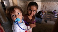 Paradis says Canada spending $8M to help kids affected by fighting in Iraq