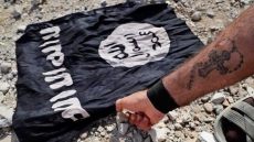 How Did An Islamic State Flag End Up In Edmonton? Flag Sellers Offer Theories