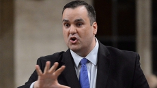 Industry minister approves Burger King deal to takeover Tim Hortons