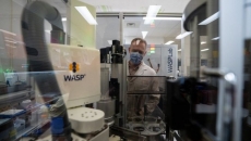 Robots Tarzan and Jane, aided by AI, take over repetitive tasks at B.C. hospital lab