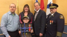 B.C. Boy, 9, Who Helped Save Mom Wins Bravery Award From Firefighters, Politicians