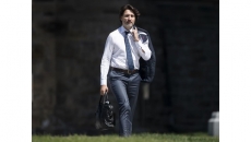 Trudeau to attend G7 in person, says British PM
