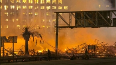 Building on fire shuts down Los Angeles freeways