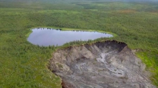 Lake Falling Off Cliff Due To Permafrost Melt New Northwest Territories Normal: Scientist