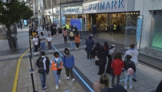 'We've missed it': Long lines form outside shops in England