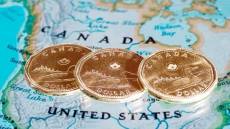 Canadian Dollar Falls Below 70-cent U.S. Mark Again, TSX Also Lower