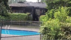 Mother And 8-Yr-Old Child Killed, 16 Other Injured In North Vancouver Housing Complex Fire