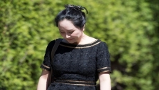 Federal court upholds redactions in Meng case