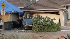 Man Arrested After Speeding Mercedes Crashes Into Surrey Home’s Garage