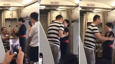 WATCH: Flight Attendant Fired After Accepting Mid-Air Marriage Proposal